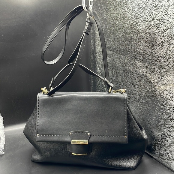 Calvin Klein 
Punk, Glam, Regency, Modern
Black, Gold - Picture 1 of 9